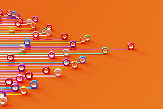 Bar graph made of colorful duct tapes on orange background. Data visualization concept.